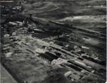 NS Ry Shops and Yards at Carolina Junction, VA., in 1946 with Locomotive Back Shops and Engine House at right, turntable in center, coal tipple upper left with Mechanical offices and Store building at lower left. NS Ry - W.R. Newton photo.
